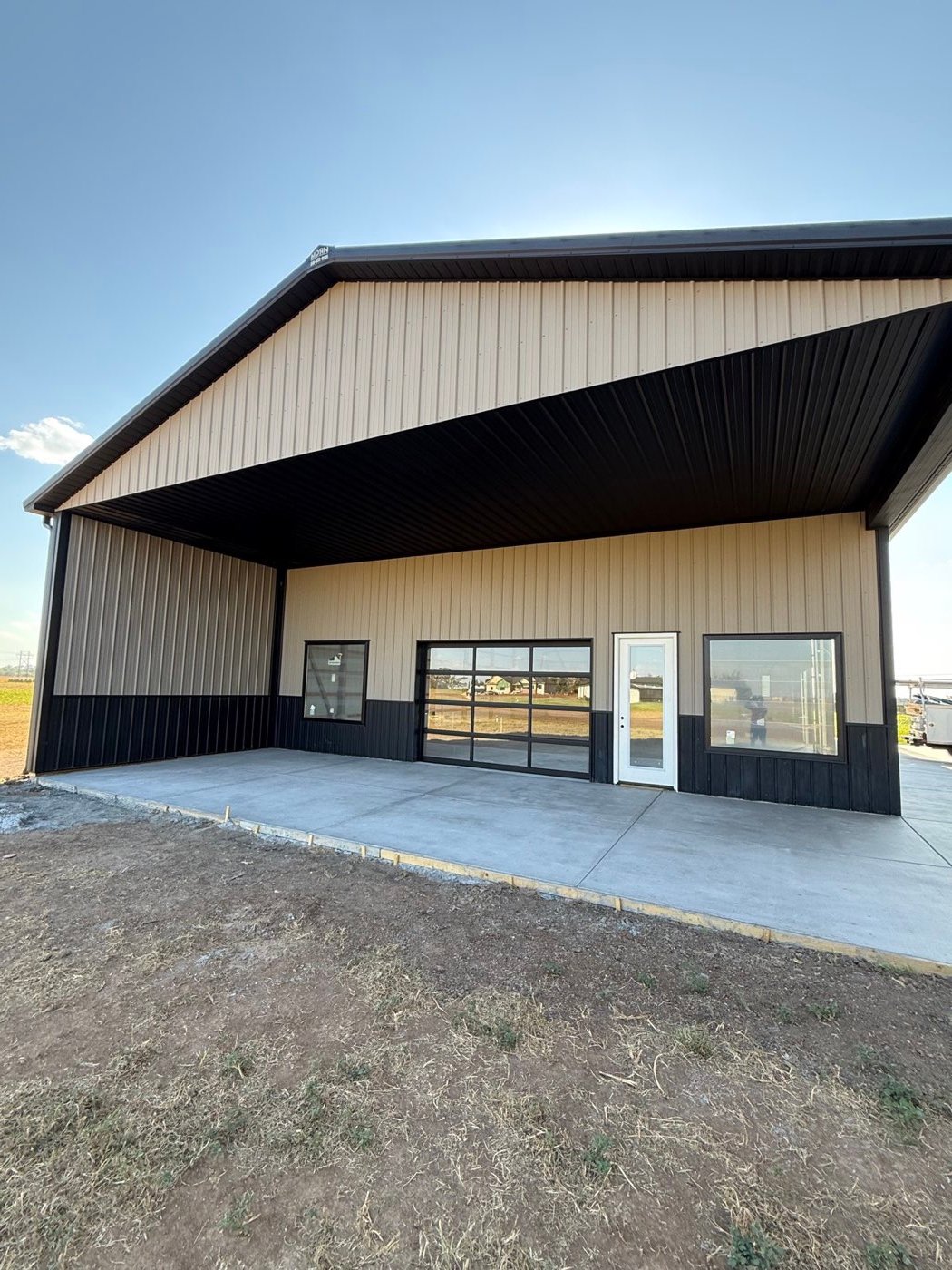Commercial building with glass storefront overhead door